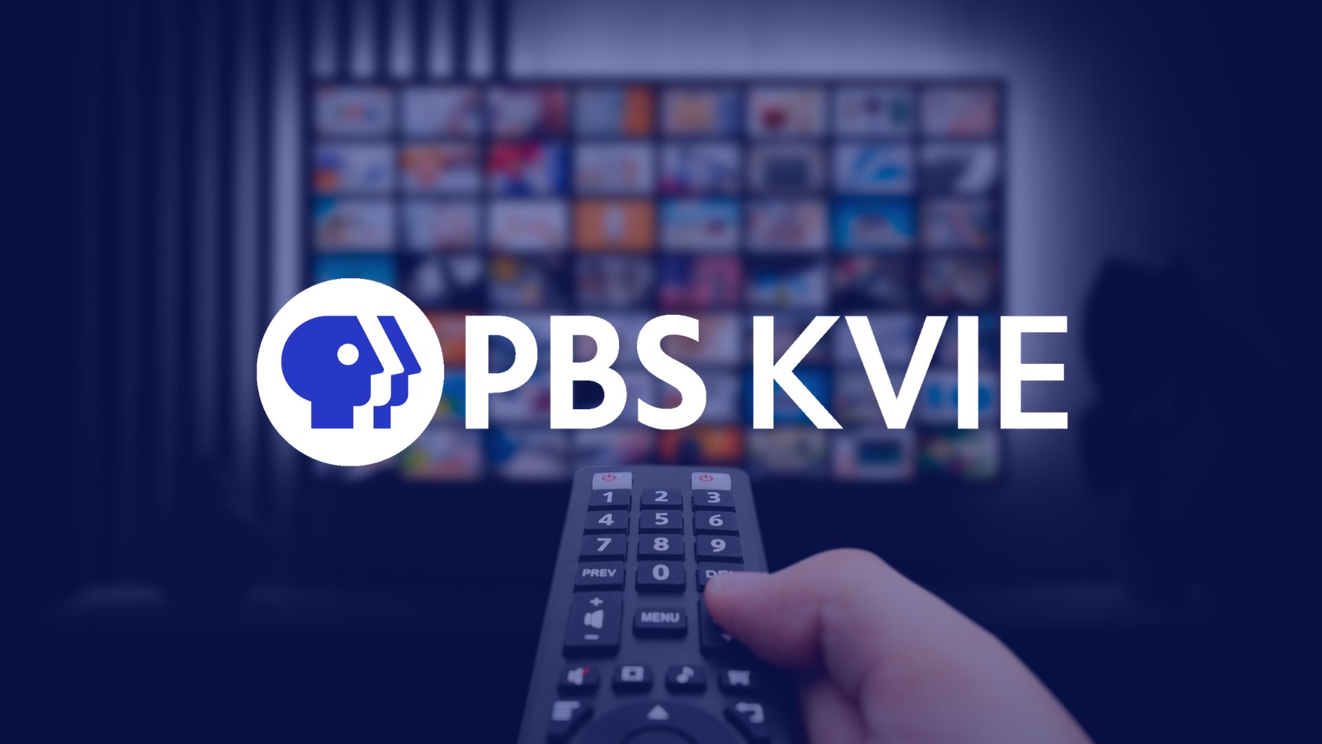 A hand holding a remote in front of the television, with the PBS KVIE logo overlaid on top.